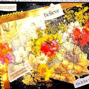 A vibrant and colorful mixed-media canvas.